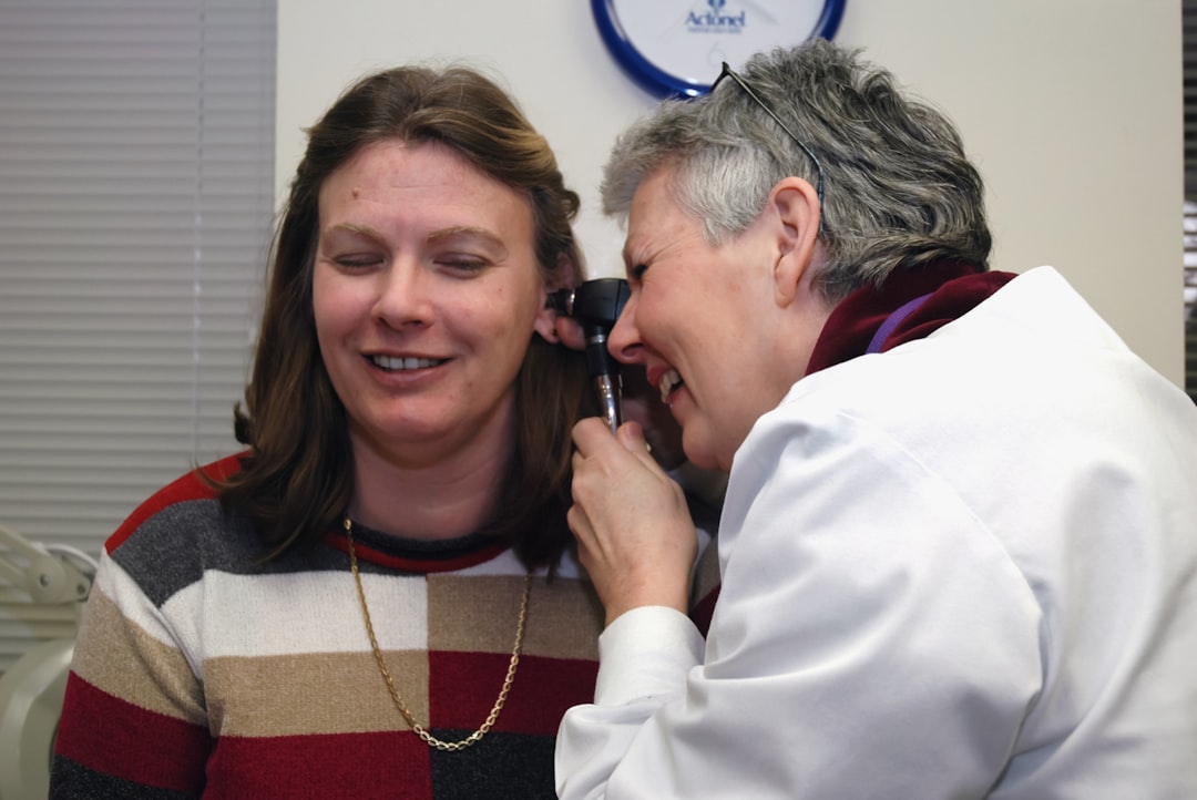 doctor examining a patient ear